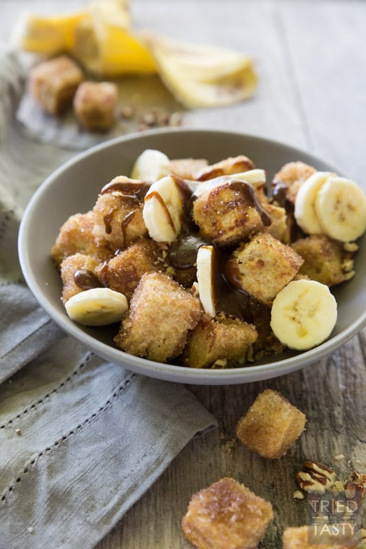 Pumpkin Spice Bananas Foster French Toast Bites // French toast is taken next level with these adorably delicious bites of heaven. You won't believe how wonderfully the flavors come together in this amazing fall inspired breakfast (that can be enjoyed all year long). The best bananas foster breakfast dessert around! | Tried and Tasty