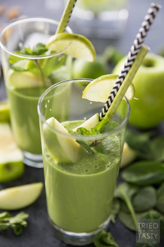 Pistachio Green Smoothie // Chances are you haven't had a green smoothie like this before. The key to this energizing boost is pistachios! Blended together with several other green favorites for a deliciously smooth drink. A nice change of pace yet tasty staple for your morning routine! | Tried and Tasty