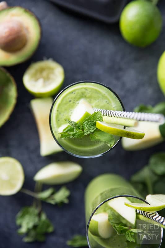 Pistachio Green Smoothie // Chances are you haven't had a green smoothie like this before. The key to this energizing boost is pistachios! Blended together with several other green favorites for a deliciously smooth drink. A nice change of pace yet tasty staple for your morning routine! | Tried and Tasty