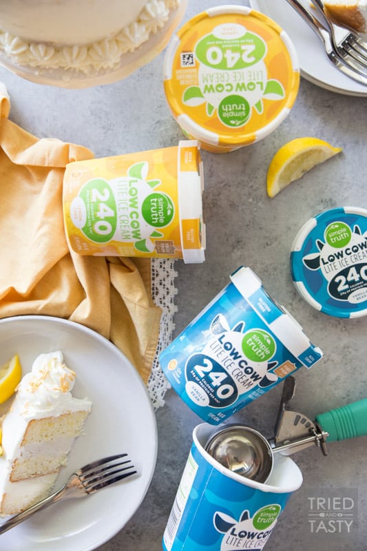 Lemon Lovers Ice Cream Cake // Calling all lemon lovers, this ice cream cake screams summer with the most delicious lemon cake sandwiched between a layer of lemon ice cream and a layer of vanilla bean ice cream covered in light and fluffy lemon whipped cream frosting! | Tried and Tasty