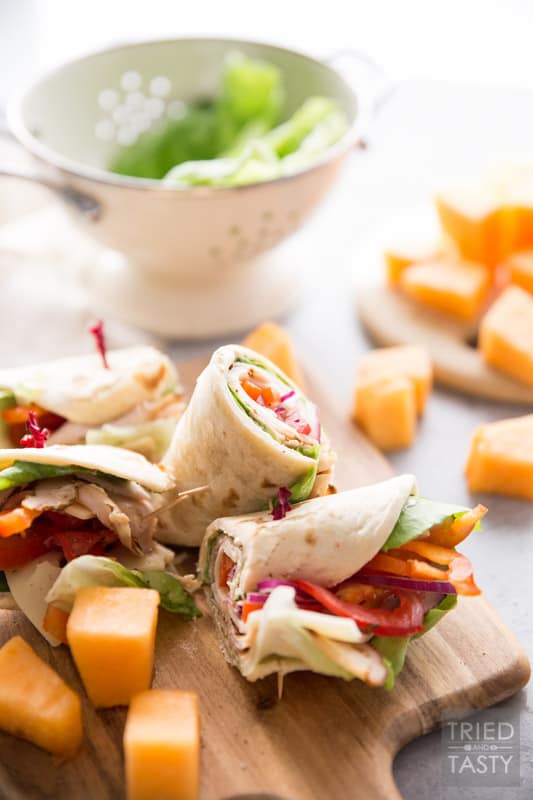 Turkey and Swiss Wrap // Lunch doesn't get easier (or tastier) than this! Start with a high quality tortilla, top with a few of your favorite things, slice and voila! Lunch is served! | Tried and Tasty