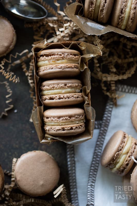 Dark Chocolate Salted Caramel French Macarons | These French Macaron’s are as tasty as they are beautiful! Dark Chocolate and Caramel are perfectly fused together between two crispy, airy layers of perfection. | Tried and Tasty