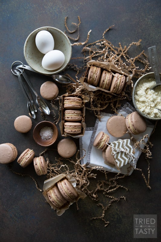 Dark Chocolate Salted Caramel French Macarons | These French Macaron’s are as tasty as they are beautiful! Dark Chocolate and Caramel are perfectly fused together between two crispy, airy layers of perfection. | Tried and Tasty